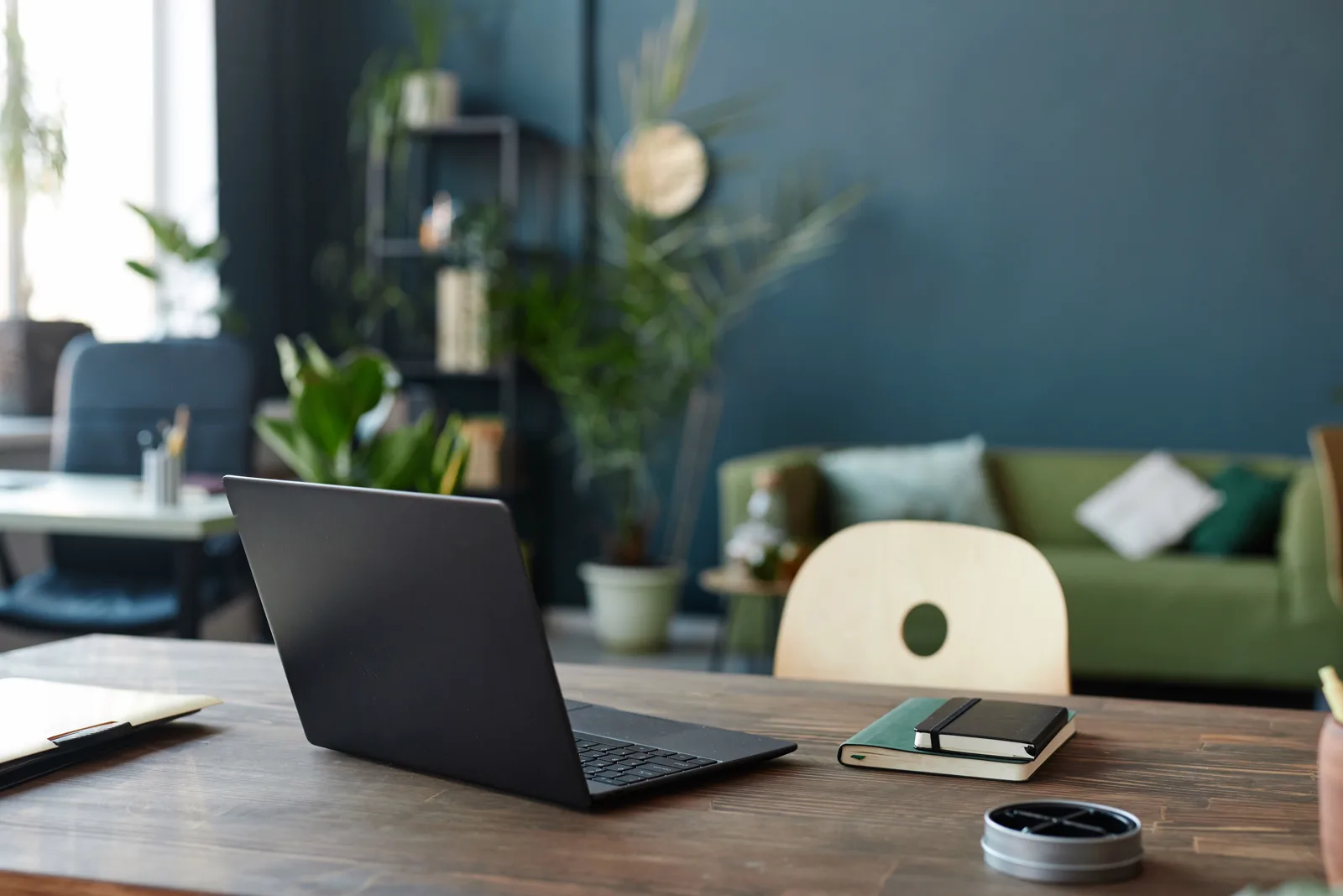 A laptop on a clean desk in a quiet, uncluttered workspace